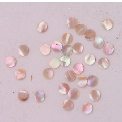 Awabi shell dots 12mm diameter 1.3mm thickness are round flat shell pcs cut to precise diameter and thickness. Ideal for use in inlay applications - for fretboard markers and general inlay or jewellery decorations. All dots are A grade.
