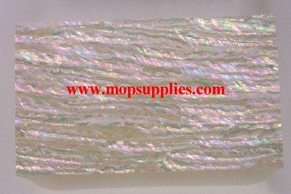 Awabi R laminated shell sheets are made from genuine shell. Each sheet has shell throughout consisting of layers of smaller shell pcs. Sheet size 235 x 135mm (9.25 x 5.3"). Thickness 1mm (0.04") Ideal for inlay work, jewellery, knife handles. Economical and easy to cut. All layers are A grade same consistency throughout the sheet.