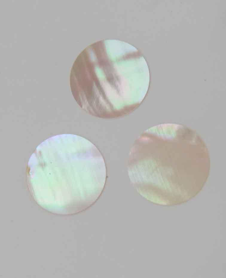 Australian Greenlip abalone shell dots 20mm diameter 0.5mm thickness polished round flat shell pcs cut to precise diameter and thickness. Ideal for use in inlay applications - for fretboard markers and general inlay or jewellery decorations. All dots are A grade.