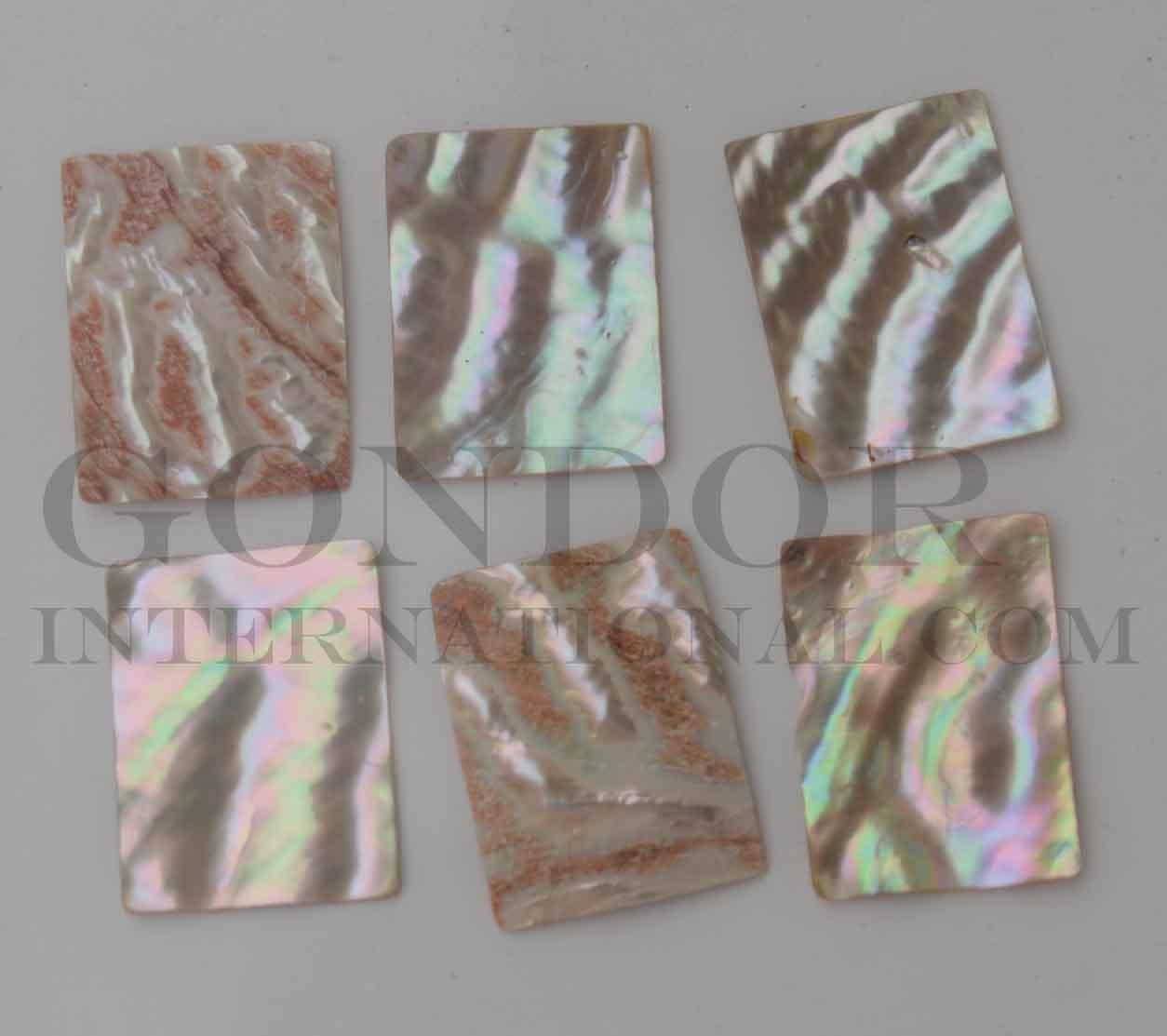 Awabi cabochons rectangle 30mm (1.18") width x 40mm (1.58") length x 2mm (0.08") thickness. Polished pcs with natural shell curve. Mainly used for jewellery but some pcs are also suitable for inlay or other decorative purposes.