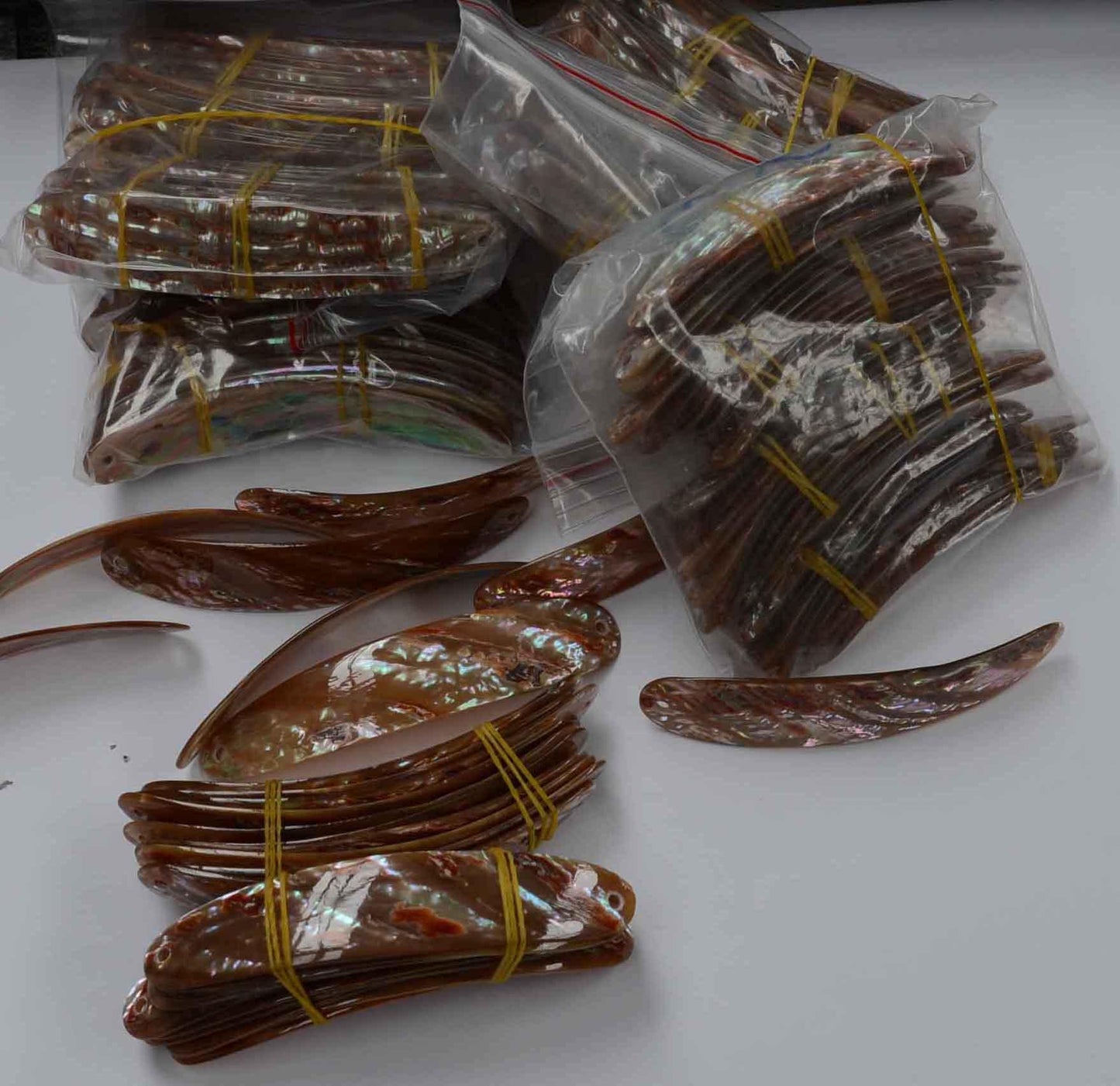 Awabi shell fishing lures (fishing spoons) are specially cut and polished solid shell pcs. Size 21 x 120mmMade to specific bent shape with holes to to fit swivels. Made using A grade shell.