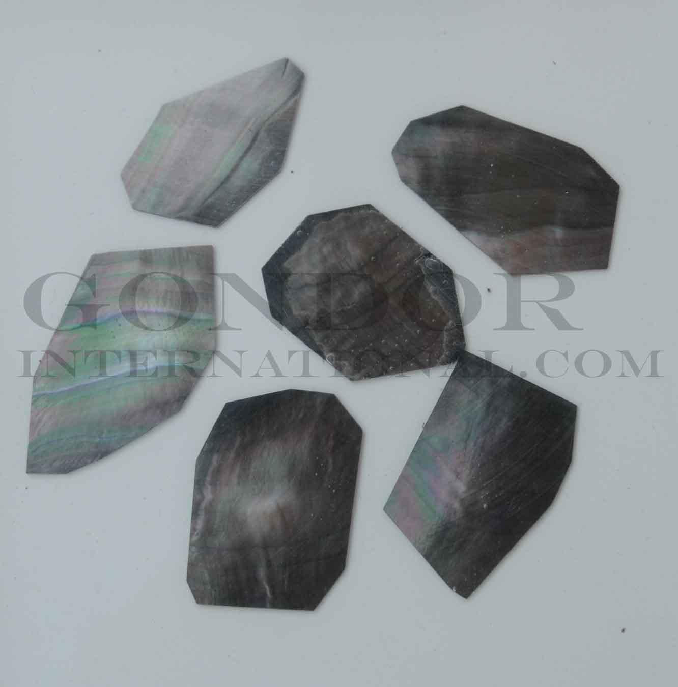 Black Mother of Pearl flat inlay blanks mix size 1.3mm (0.05") thickness irregular shape A grade. Sold by oz - approx. 7 - 10pcs per oz size approx. 15-30mm x 20-45mm
