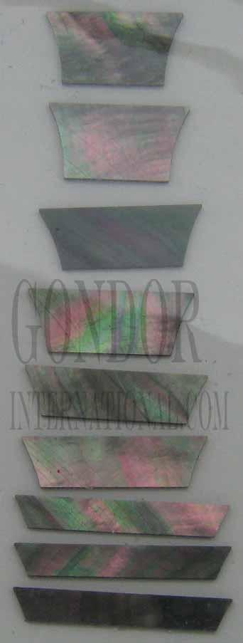 A set of 9pcs Black MOP crown inlays. Suitable for Les Paul or SG style guitars. Shell thickness 1.5mm. Flat and ready to be installed