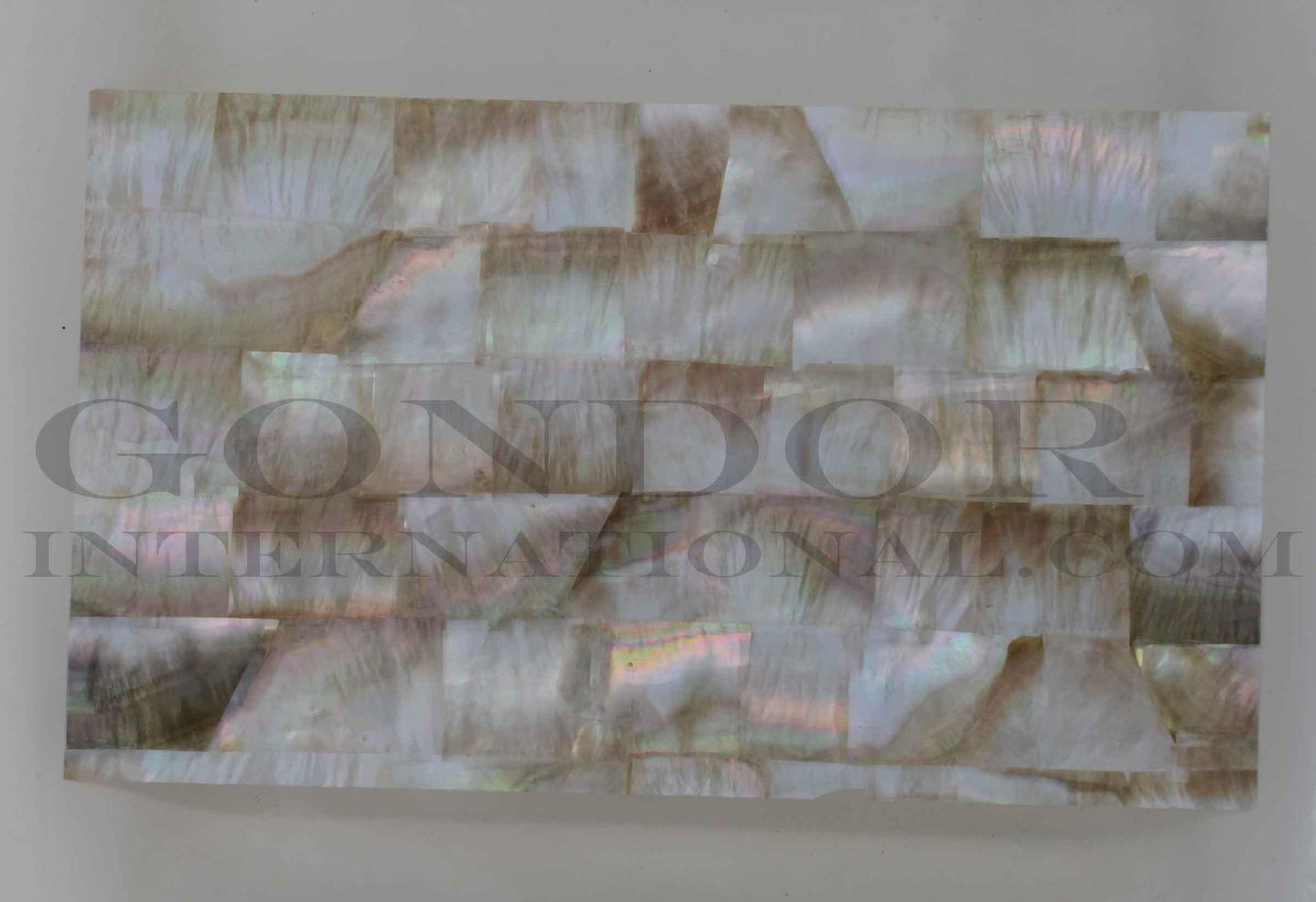 Black MOP veneer B also called Black MOP B sheet or Black MOP B shell paper. Made from thin slices of genuine shell. Standard sheet size 140mm (5.51") width x 240mm (9.45") length x 0.15mm (0.006") thickness Suitable for signwriting, fishing lures, jewellery, architectural application, furniture and many other applications.