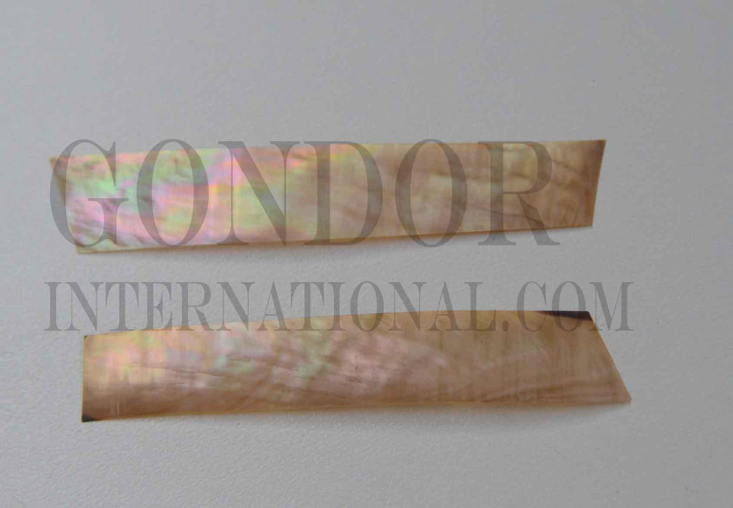 Brownlip MOP shell feathers 20mm (0.79") width x 100mm (3.93") length x 0.15mm (0.006") thickness - thinly sliced solid shell pcs. Cut along the curved part of shell they can yield larger pcs then standard solid shell blanks. Ideal for shallow inlay, overlay, fishing lure manufacture and other decorative purposes. Select quality A grade.