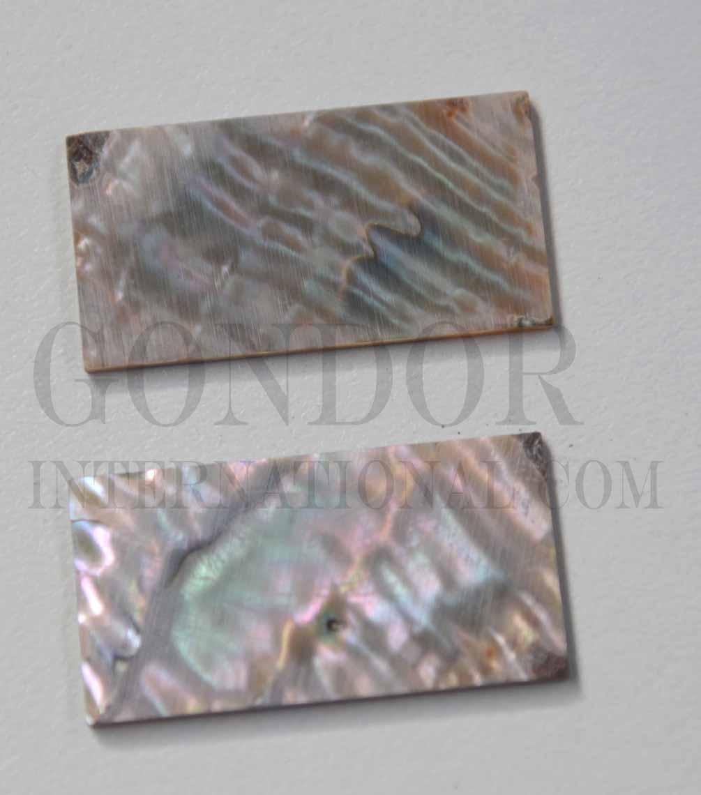 <p>Green abalone (Mexican green abalone) flat inlay blanks rippled material size 22mm (0.866") width x 42mm (1.65") length x 1.5mm (0.06") thickness A grade.</p>