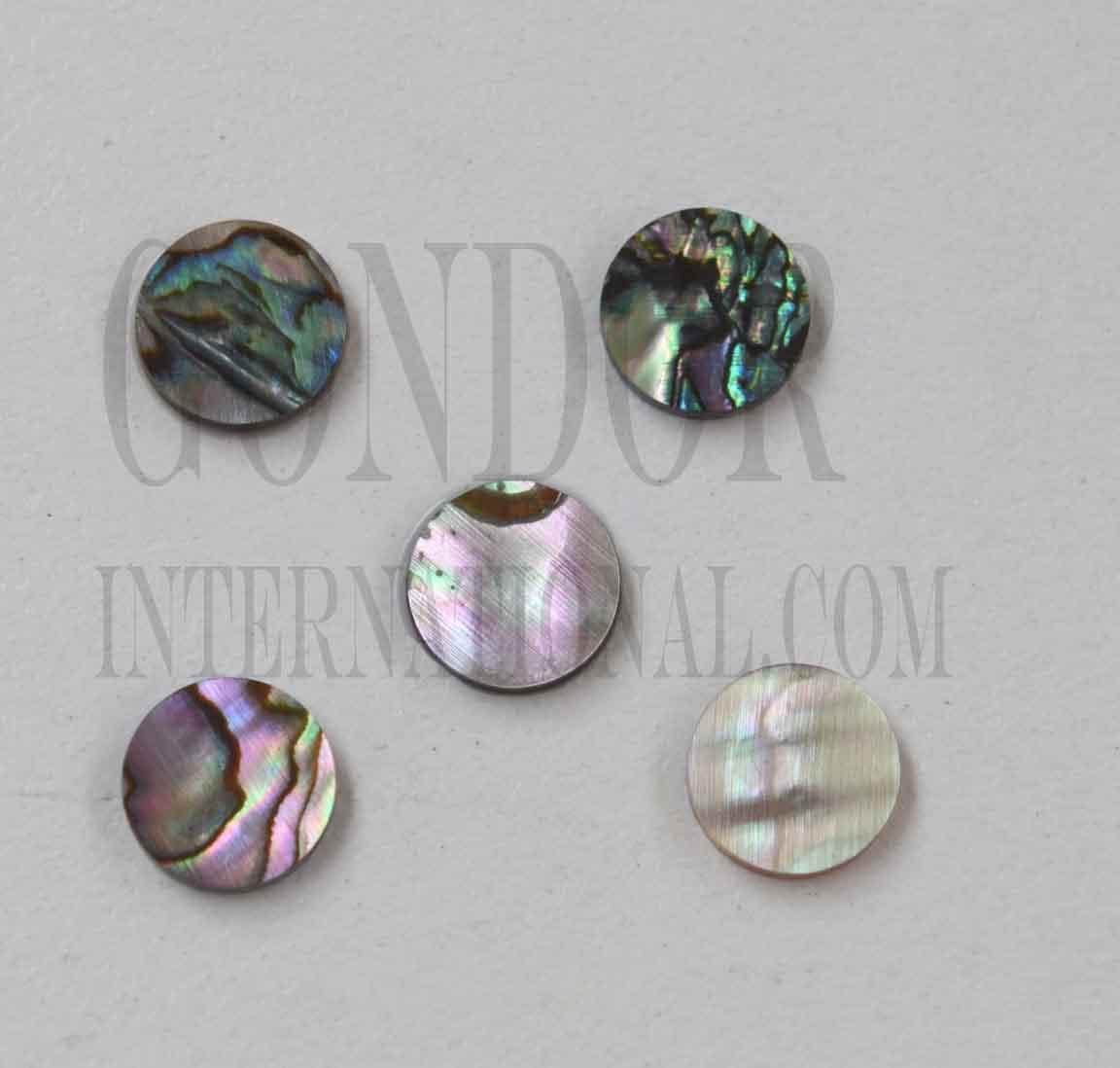 <p>Green abalone dots 7.5mm x 1.3mm thickness are round flat shell pcs cut to precise diameter and thickness. Ideal for use in inlay applications - for fretboard markers, bow frogs and general inlay, marquetry or jewellery decorations. All pcs are A grade. </p>