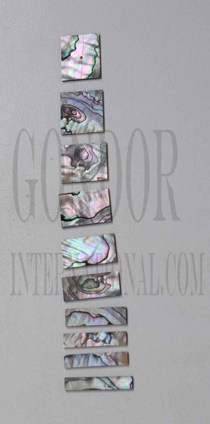 A set of 9pcs Green abalone bass inlays. Suitable for Precision, Jazz style guitars. Shell thickness 1.5mm. Flat and ready to be installed.