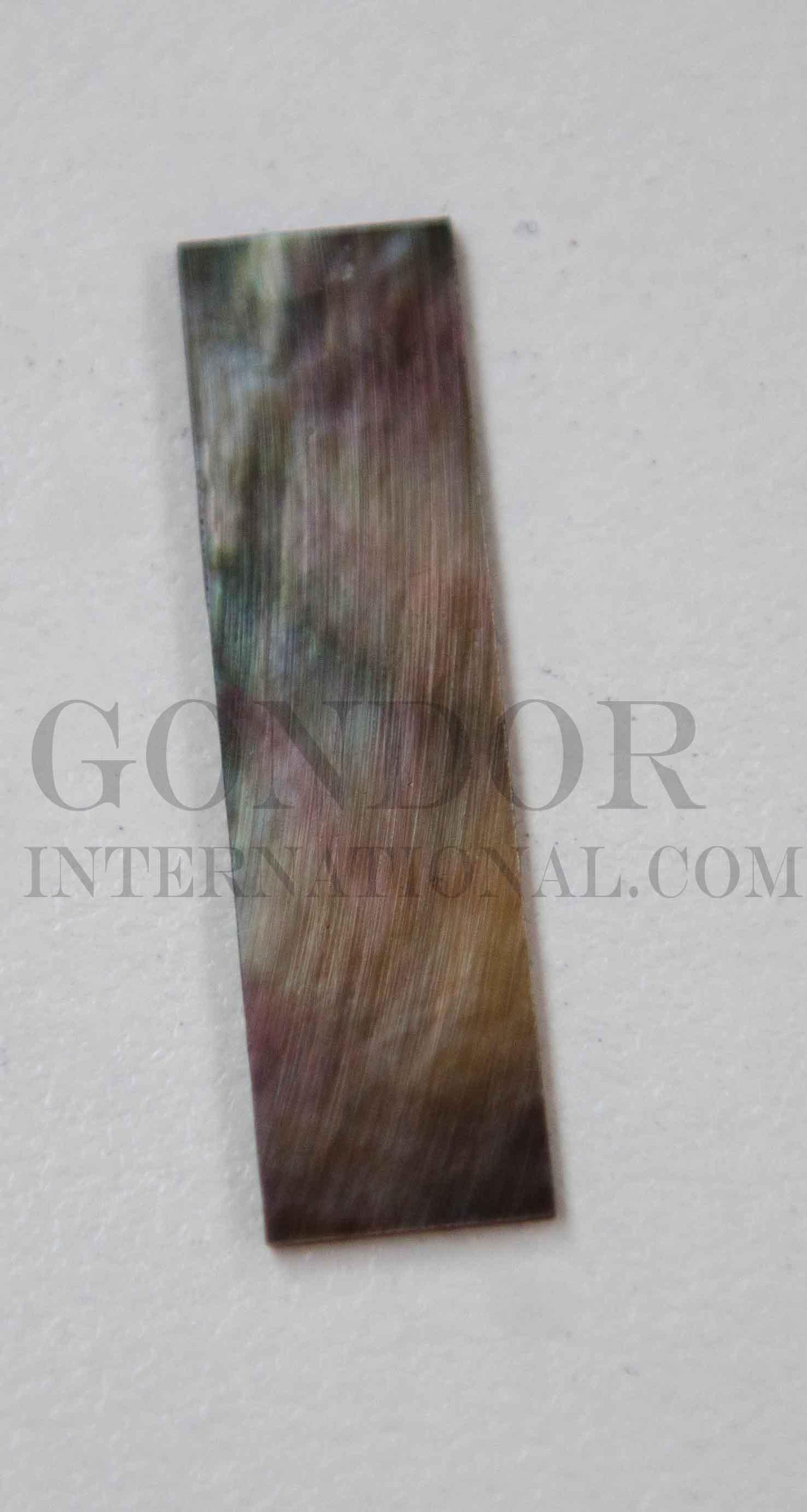 Black MOP solid shell straight strips 6.35mm (1/4") x 25mm (1") length x 1.3mm (0.05") thickness. A grade quality good on both sides, flat and uniform in thickness and width. Ideal for use in purfling on musical instruments - Ukuleles, guitars, mandolins etc. as well as in furniture, jewellery ans other decorative applications.