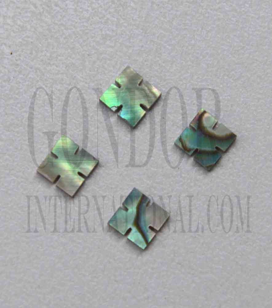 <p>Paua abalone (New Zealand Paua abalone) notched squares size 4mm (0.157") square x 1.5mm (0.06") thickness. Some uses include fretboard markers, musical instrument inlay, furniture inlay, marquetry, pool cue inlay and other general decorative inlay and jewellery applications. All pcs are A grade.</p>
