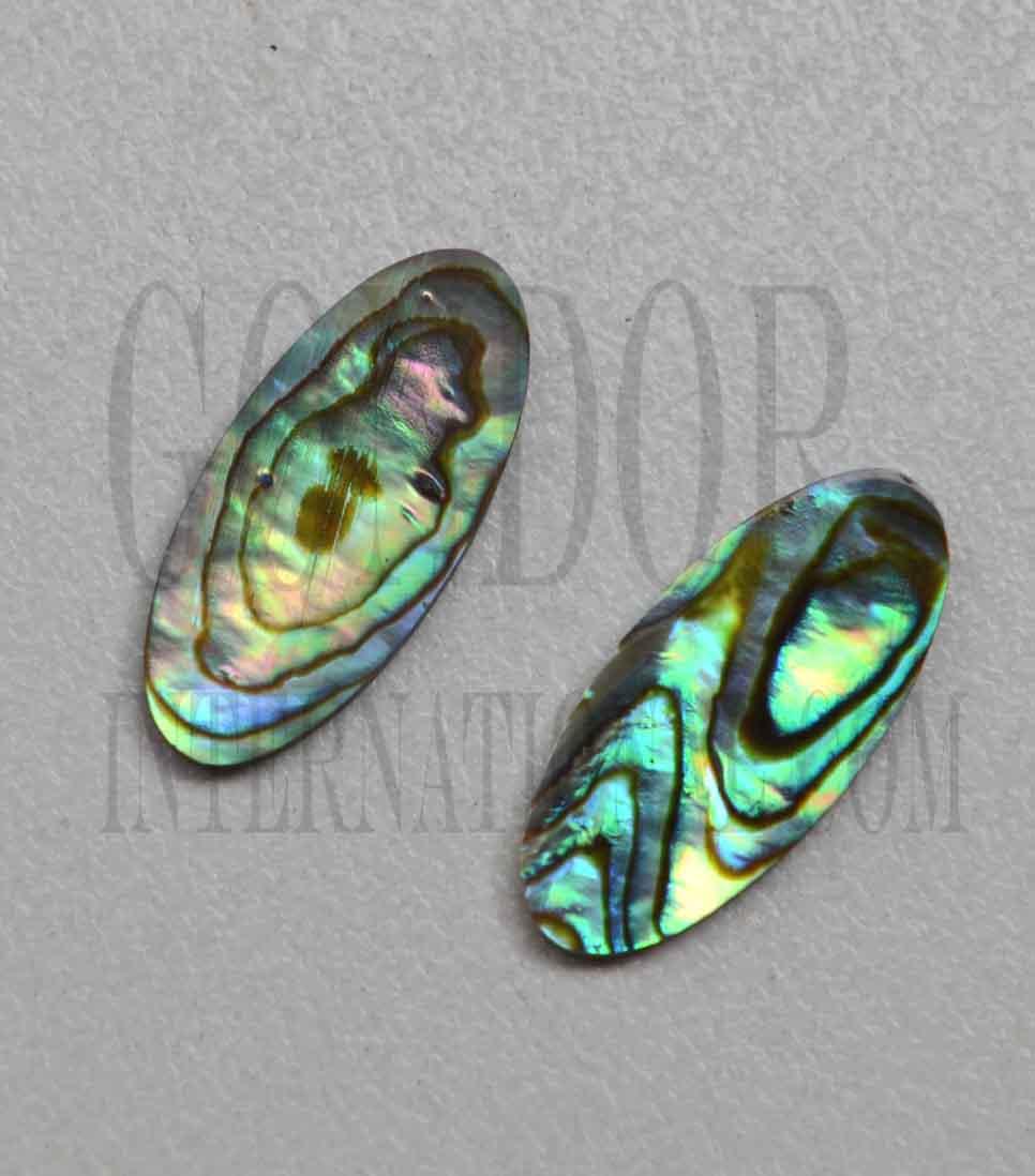 <p>Paua abalone (New Zealand Paua abalone) polished ovals size 10mm (0.394") width x 22mm (0.87") length x 1.5mm (0.06") thickness. Some uses include fretboard markers, musical instrument inlay, furniture inlay, marquetry, pool cue inlay and other general decorative inlay and jewellery applications. All pcs are A grade.</p>