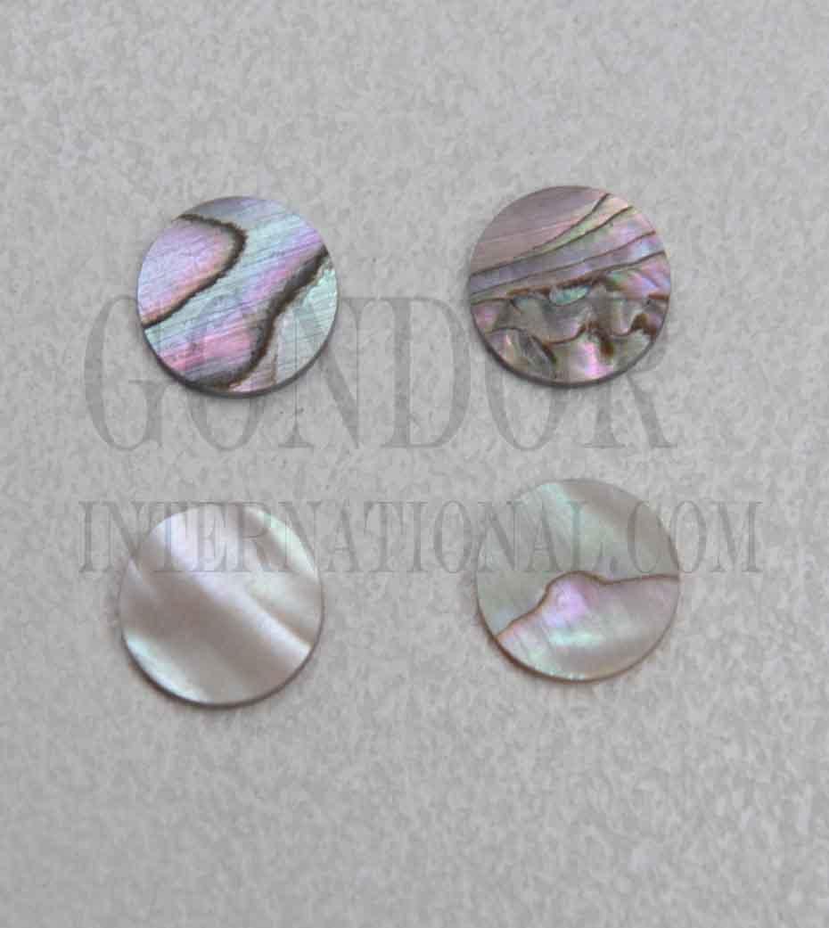 Red abalone dots 7.16mm (9/32") diameter x 1.3mm thickness - round flat shell pcs cut to precise diameter and thickness. Ideal for use in inlay applications - for fretboard markers, bow frogs and general inlay or jewellery decorations. All dots are A grade good on both sides.