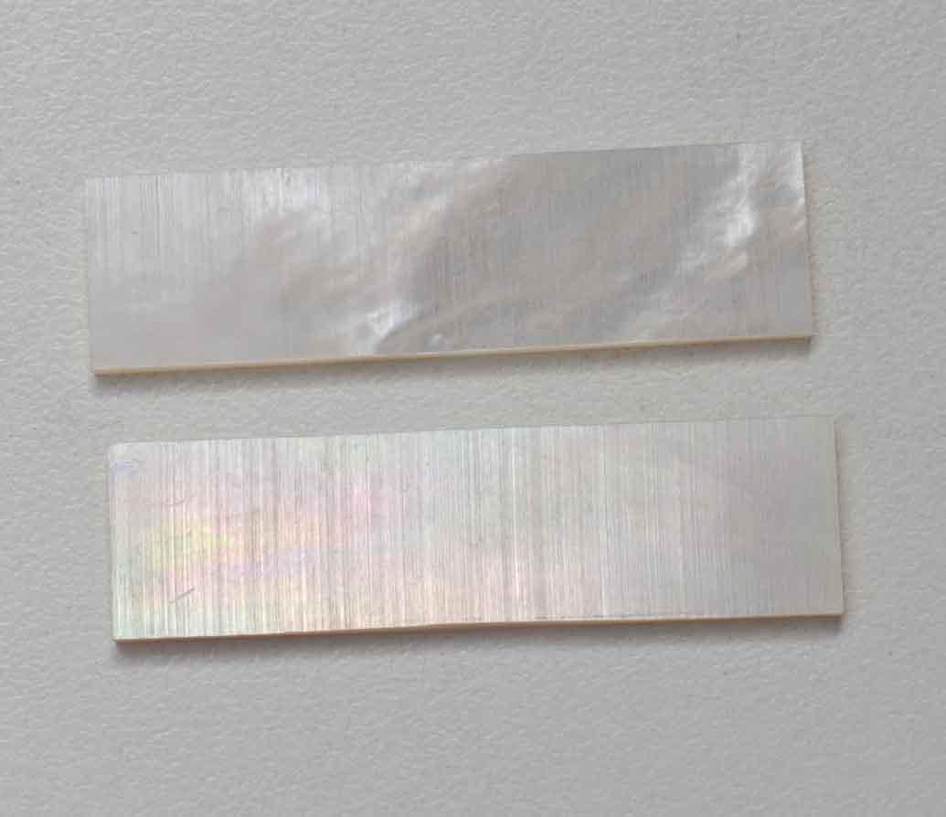 <p>White Mother of Pearl flat inlay blanks size 11mm (0.433") width x 40mm (1.57") length x 1mm (0.04") thickness A grade good on both sides.</p>