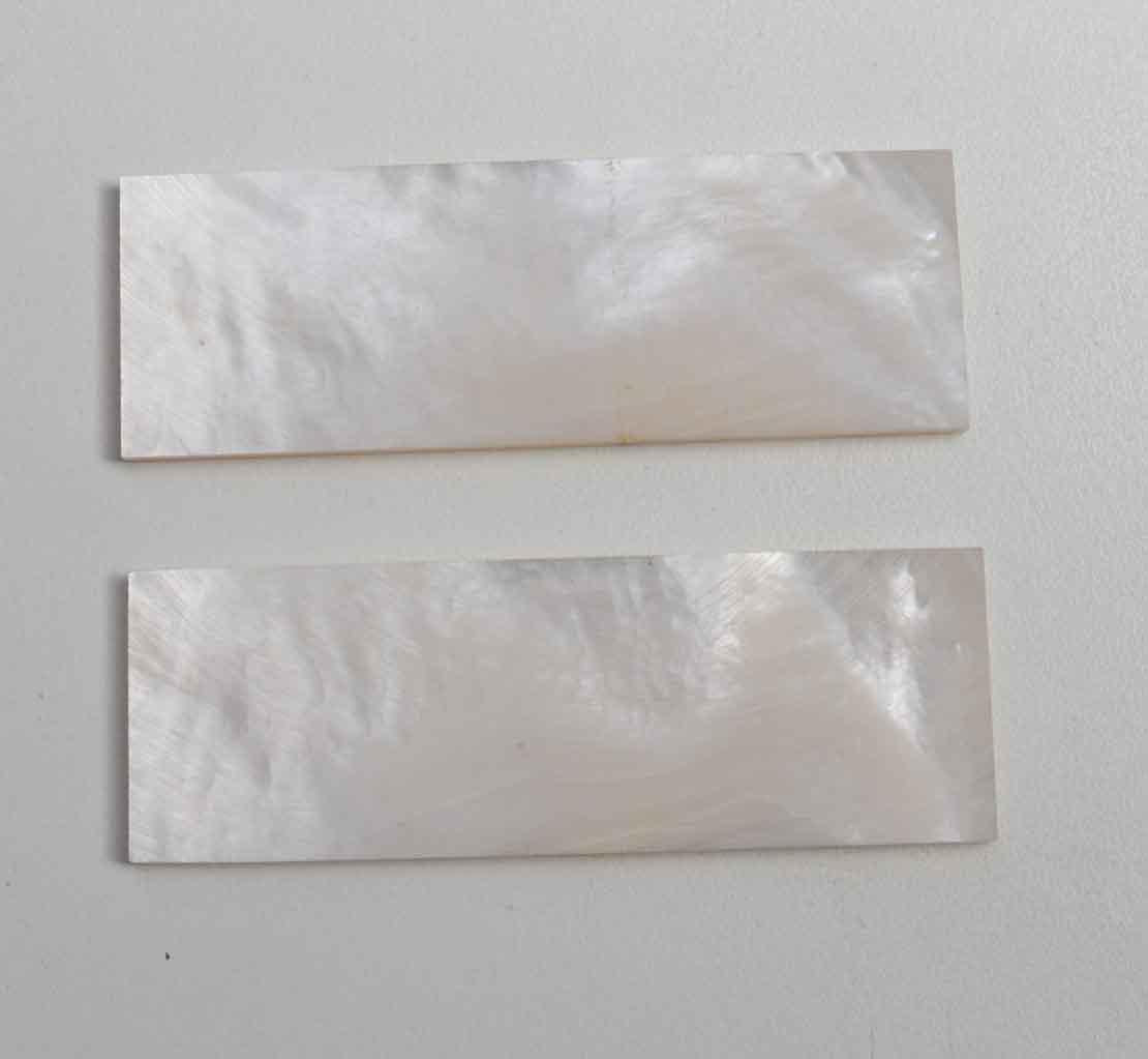 <p>White Mother of Pearl flat inlay blanks size 37mm (1.46") width x 108mm (4.25") length x 4mm (0.157") thickness.</p>
