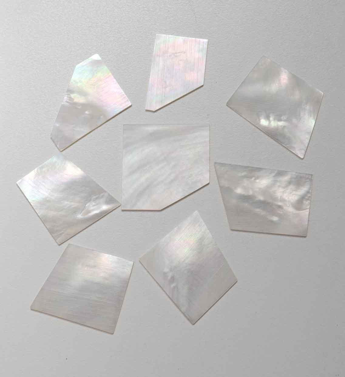 <p>White Mother of Pearl flat inlay blanks medium size size 25 - 40mm (1 - 1.57") width x 30 - 50mm (1.18 - 2") length x 1mm (0.04") thickness A grade good on both sides.</p>