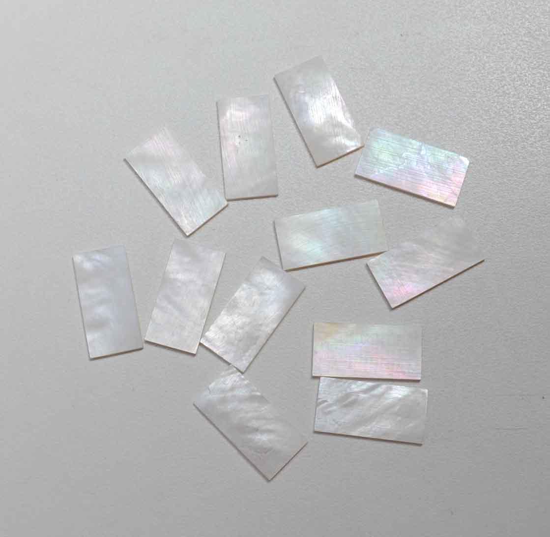 White Mother of Pearl flat inlay blanks small size 20 - 30mm (0.79 - 1.18") width x 25 - 40mm (1 - 1.57") length x 1mm (0.04") thickness A grade good on both sides.