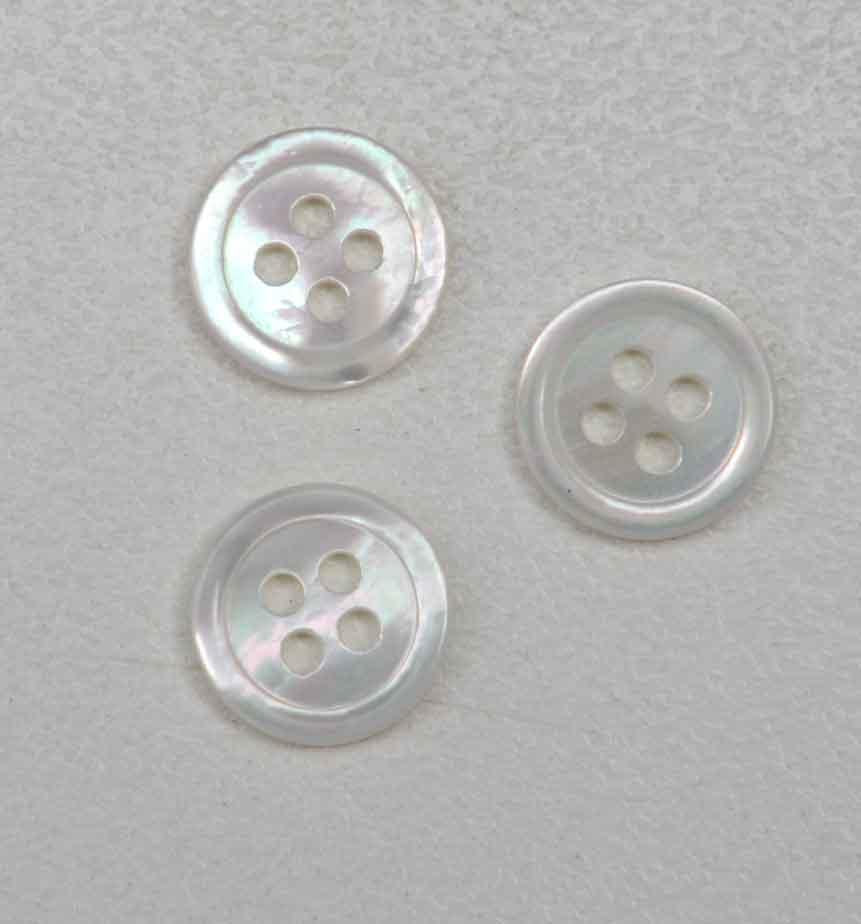 <p>White Mother of Pearl buttons 4 hole size 18L (11.39mm) x 2mm thickness white both sides, finished buttons.</p>