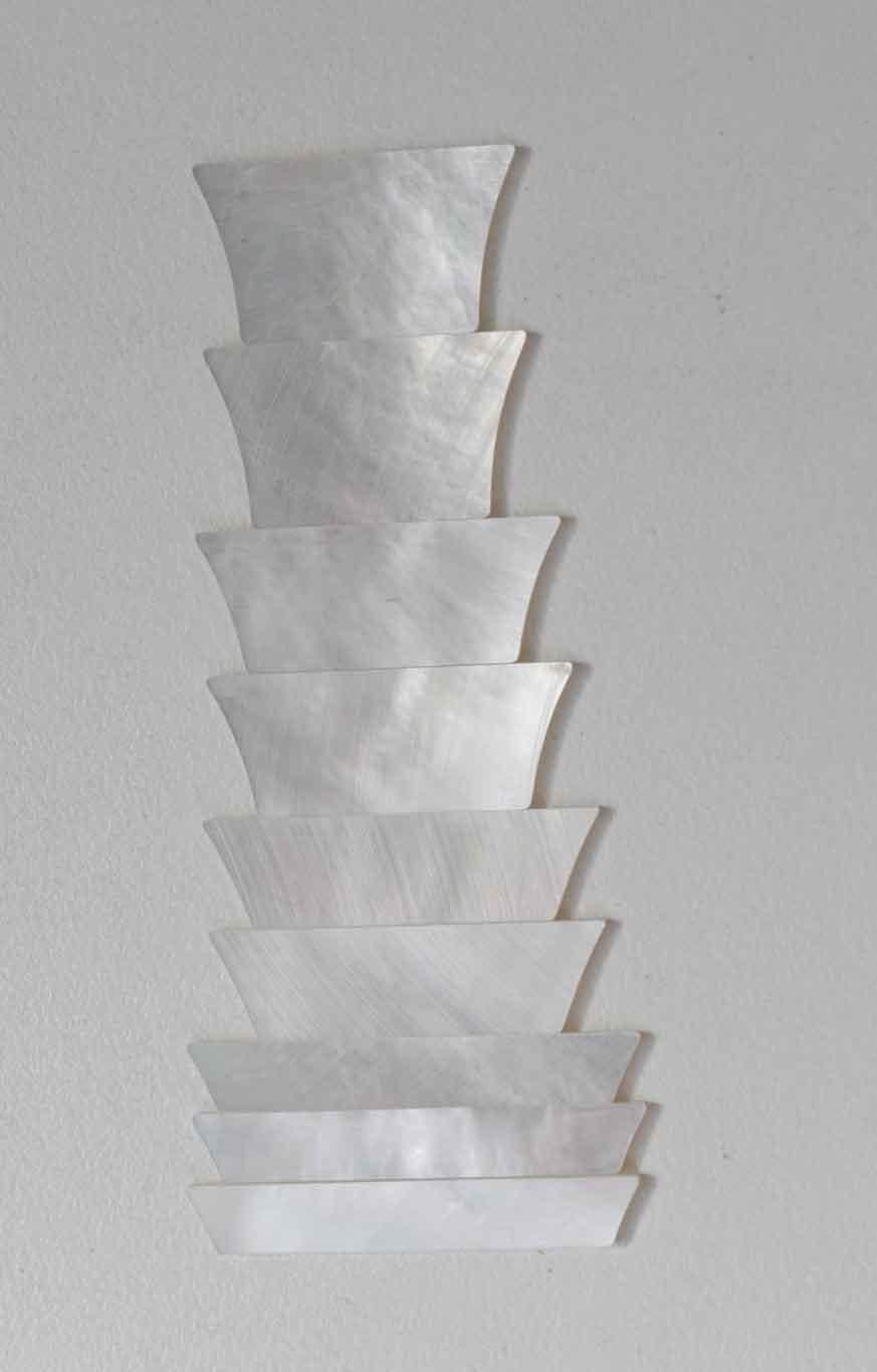 A set of 9pcs White MOP crown inlays. Suitable for SG, Les Paul style style guitars. Shell thickness 1.5mm. Flat and ready to be installed.