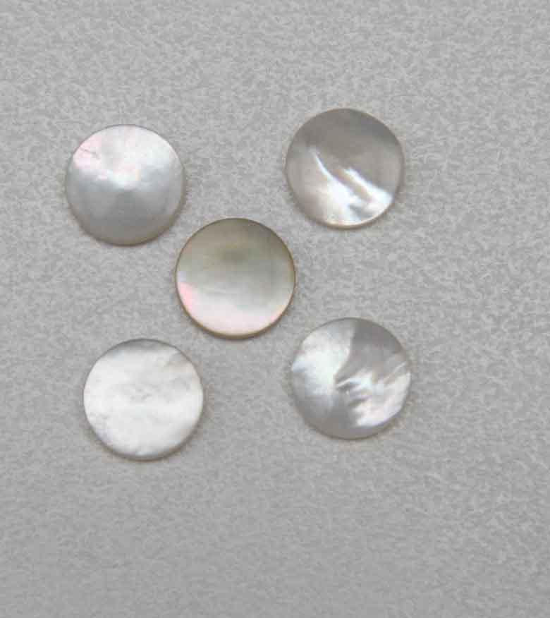 <p>White Mother of Pearl dots 14.2mm (0.56") diameter x 2mm (0.079") thickness - round flat shell pcs cut to precise diameter and thickness. Ideal for use in inlay applications - for fretboard markers, bow frog eyes, watch dials, button blanks and general inlay or jewellery decorations. All dots are A grade good on both sides. </p>