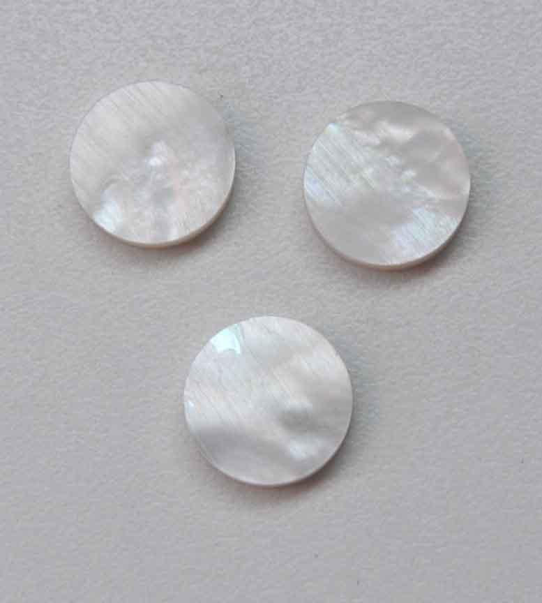 White Mother of Pearl dots 15.4mm (0.6") diameter x 1.3mm (0.05") thickness - round flat shell pcs cut to precise diameter and thickness. Ideal for use in inlay applications,, watch dials, button blanks and jewellery decorations. All dots are A grade good on both sides.