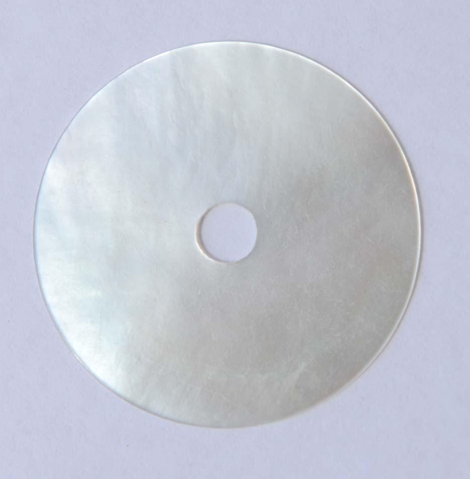 <p>White Mother of Pearl discs with center hole 33mm (1.3") diameter x 0.3mm (0.0118") thickness Center hole 5mm (0.197") - round flat shell pcs cut to precise diameter and thickness. Ideal for watch dials, inlay, jewellery decorations. All discs are A grade polished and good on both sides. </p>