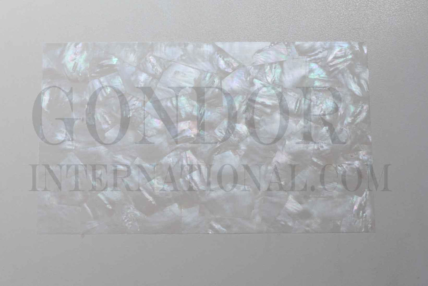 White MOP laminated shell sheets made from genuine shell. Each sheet has shell throughout consisting of layers of smaller shell pcs. Sheet size 235 x 135mm (9.25 x 5.3"). Thickness 3mm (0.118") Ideal for inlay work, jewellery, knife handles. Economical and easy to cut. All layers are same consistency throughout the sheet.