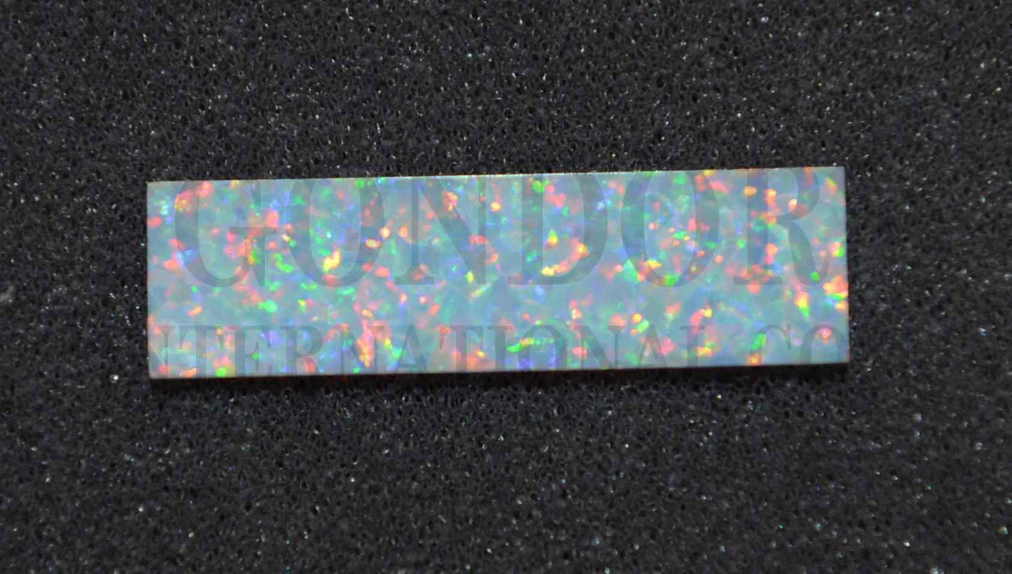 <p>Opal blanks OP17 8.5 x 30 x 1mm (0.335 x 1.18 x 0.04 flat cut pcs polished 1 side made from manufactured opal blocks suitable for inlay jewellery, bow slides. Opal blanks can be cut same way as mother of pearl blanks and are of similar hardness.</p>