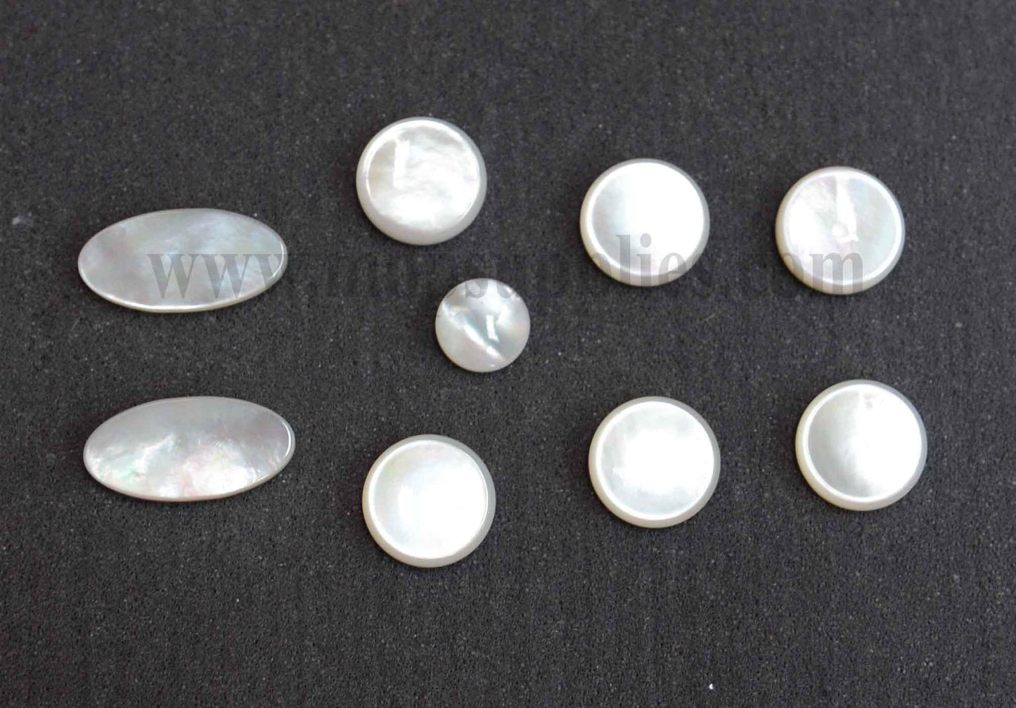 <p>White Mother of Pearl saxophone finger button inlay set 2.5mm (0.1") thickness polished on 1 side. Individual sizes Concave round button 6pcs 15.1 x 2.5mm, Convex round button 1pc 10.9 x 2.5mm Oval button 2pcs 11.9 x 24 x 2.5mm. All pcs are A grade.</p>