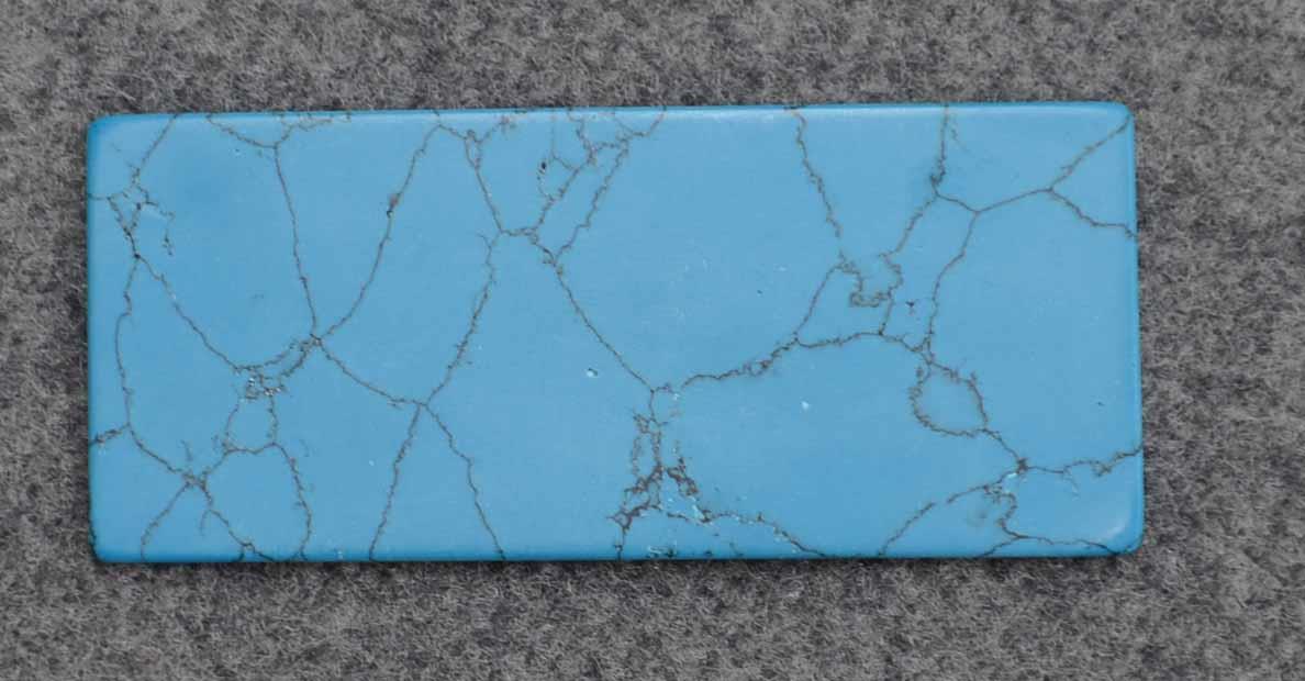 <p>Turquoise CH2A6 reconstituted stone blanks 30 x 70 x 1.5mm suitable for inlay. Can be cut with standard cutting tools - jewellery saw similar in characteristics to mother of pearl (hardness approx. 3. Can be sanded and polished same way as shell material. All pcs are A grade good on both sides.</p>