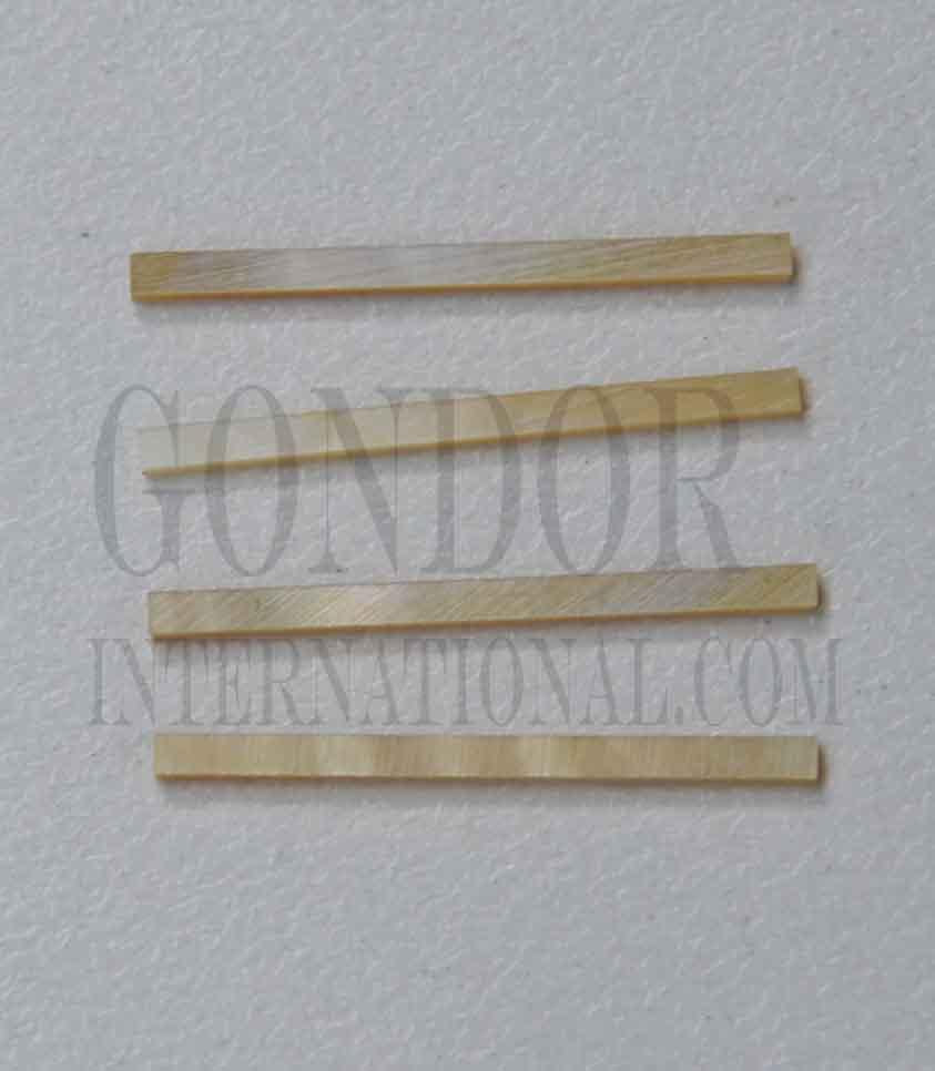 Gold MOP solid shell straight strips 1.5mm (0.059") width x 25mm (1") length x 1.3mm (0.05") thickness. A grade quality good on both sides, flat and uniform in thickness and width. Ideal for use in purfling on musical instruments - Ukuleles, guitars, mandolins etc. as well as in furniture, jewellery ans other decorative applications.