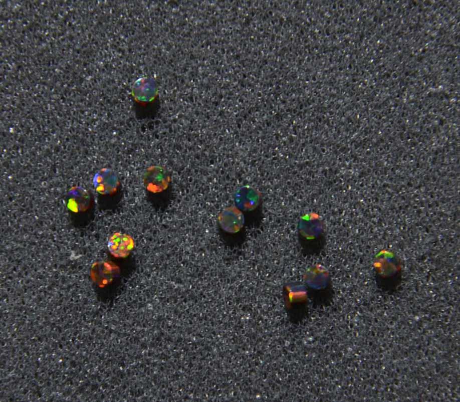 <p>Opal dots OP34 2 x 1.3mm 0.0787 x 0.05" flat pcs made to specific diameter and thickness made from manufactured opal suitable for inlay, fretboard markers, jewellery, Opal dots can be worked same way as mother of pearl and are of similar hardness.</p>