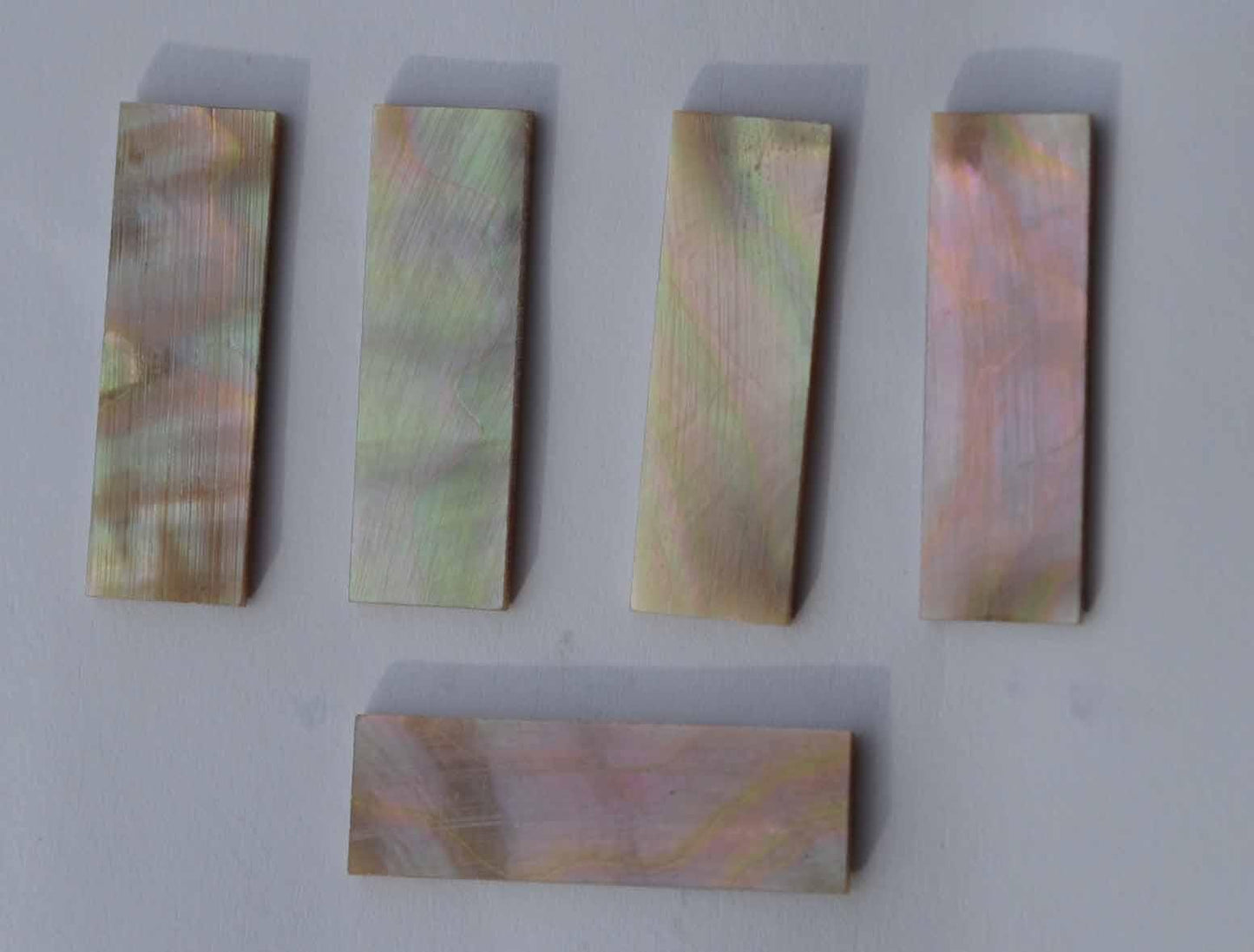 Awabi flat inlay blanks 8x30x1mm B grade - may have some shell skin or worm damage mostly on 1 side, Also used as Awabi (Goldfish) bow slides for violin and cello.
