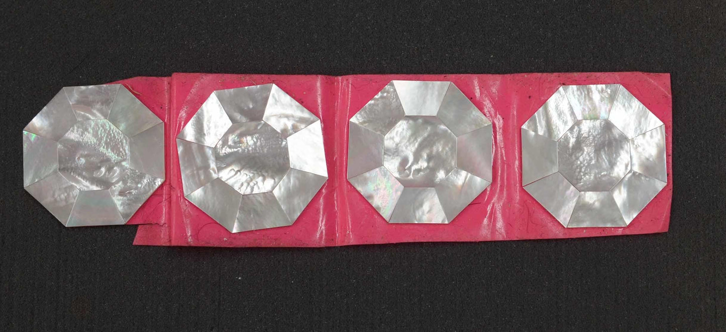 <p>White Mother of Pearl octagon blanks size 50mm (1.97") x 1.5mm (0.06") thickness. Made up of 9pc. Suitable for inlay and jewellery applications. All pcs are A grade.</p>