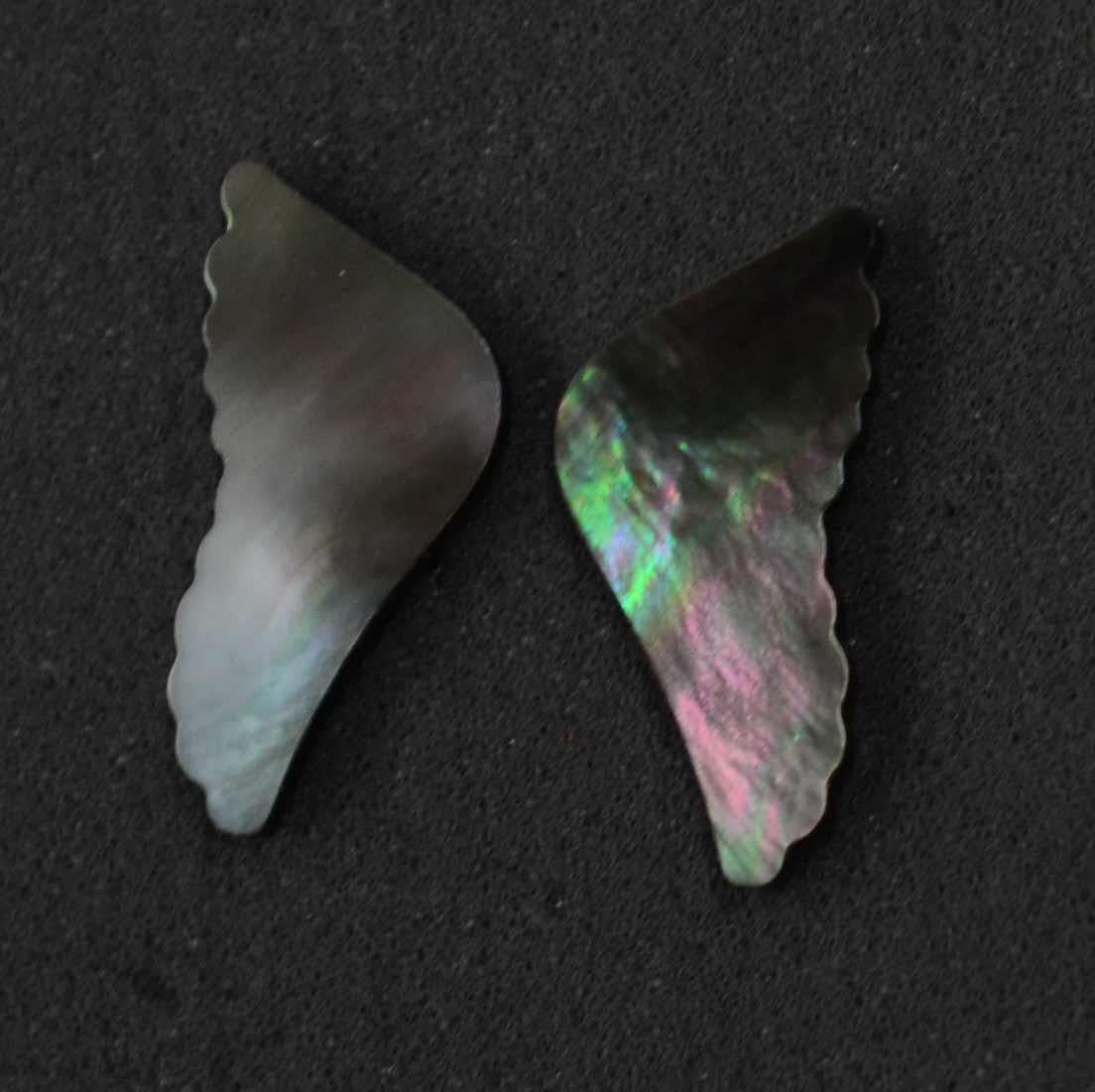 Black Mother of Pearl wing size 17.11mm (0.674") wide x 35mm (1.38") length x 2.5mm (0.098") thickness. Polished both sides. Suitable for jewellery cabochons, inlay, furniture inlay and other general decorative and jewellery applications. All pcs are A grade.