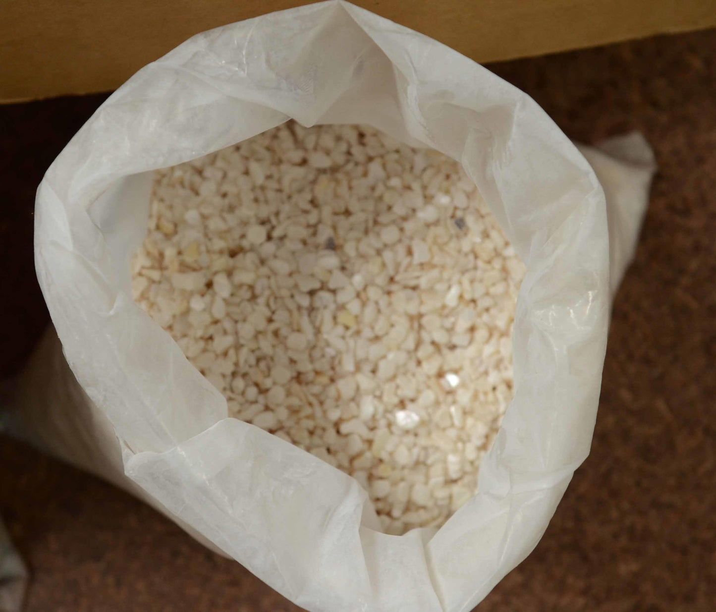 <p>Mother of Pearl random chips (aggregate) size # 2 4.5 -7mm suitable for terrazzo applications as well as other decorative uses.</p>