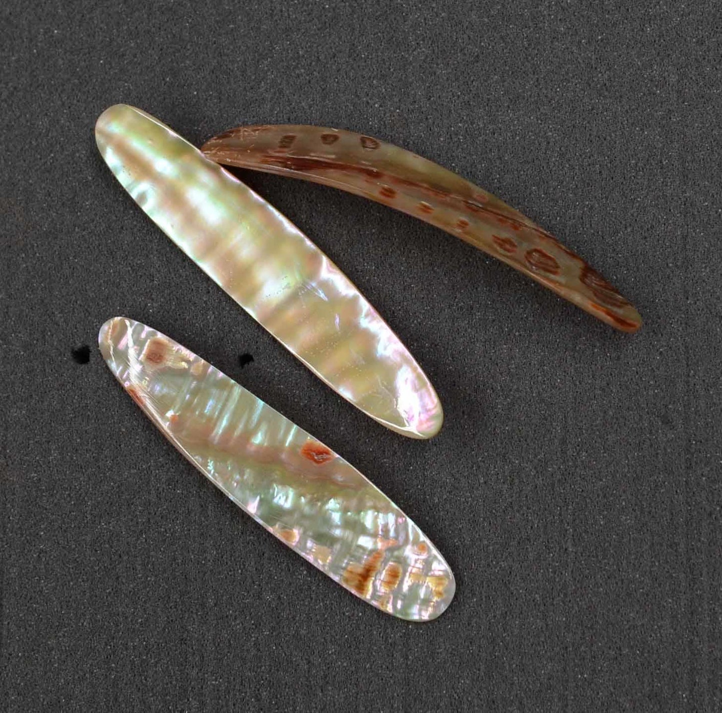 Awabi shell fishing lures (fishing spoons) are specially cut and polished solid shell pcs. Size 16 - 18 x 75-80x 1.5-2mm Made to specific bent shape without holes from A grade shell.