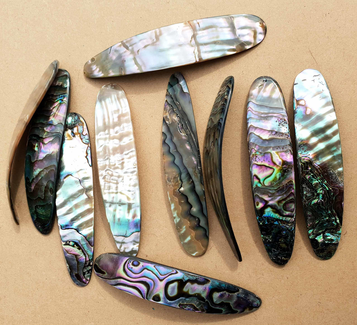 <p>Green abalone shell fishing lures (fishing spoons) are specially cut and polished solid shell pcs. Size 19-20mm (0.79") width x 85-90mm(3.35- 3.54") x 1.5-2mm (0.06) length Made to specific bent shape with no holes to to fit swivels. Made using A grade shell.</p>