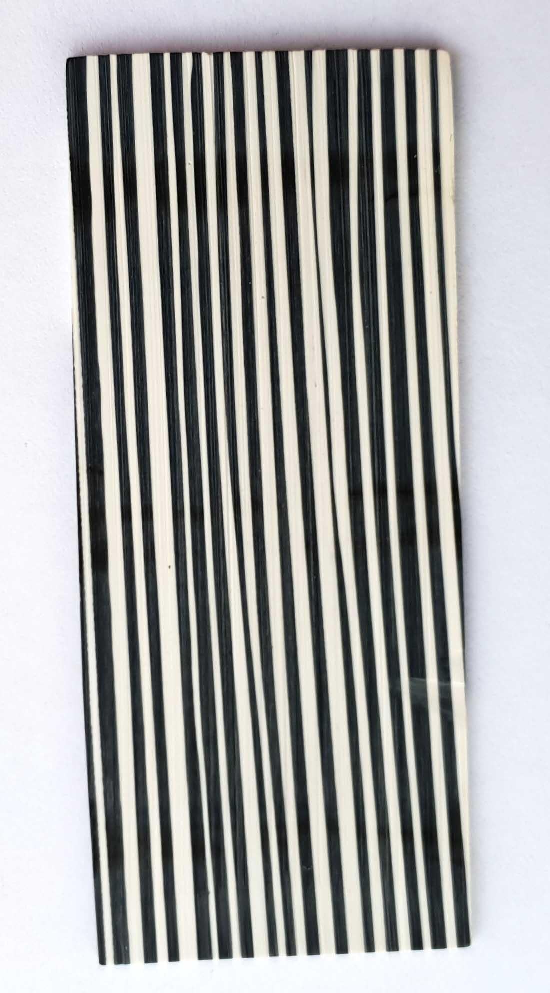 <p>Stripe stone CH2H2 reconstituted stone blanks 30 x 70 x 1.5mm suitable for inlay. Can be cut with standard cutting tools - jewellery saw similar in characteristics to mother of pearl (hardness approx. 3. Can be sanded and polished same way as shell material. All pcs are A grade good on both sides.</p>