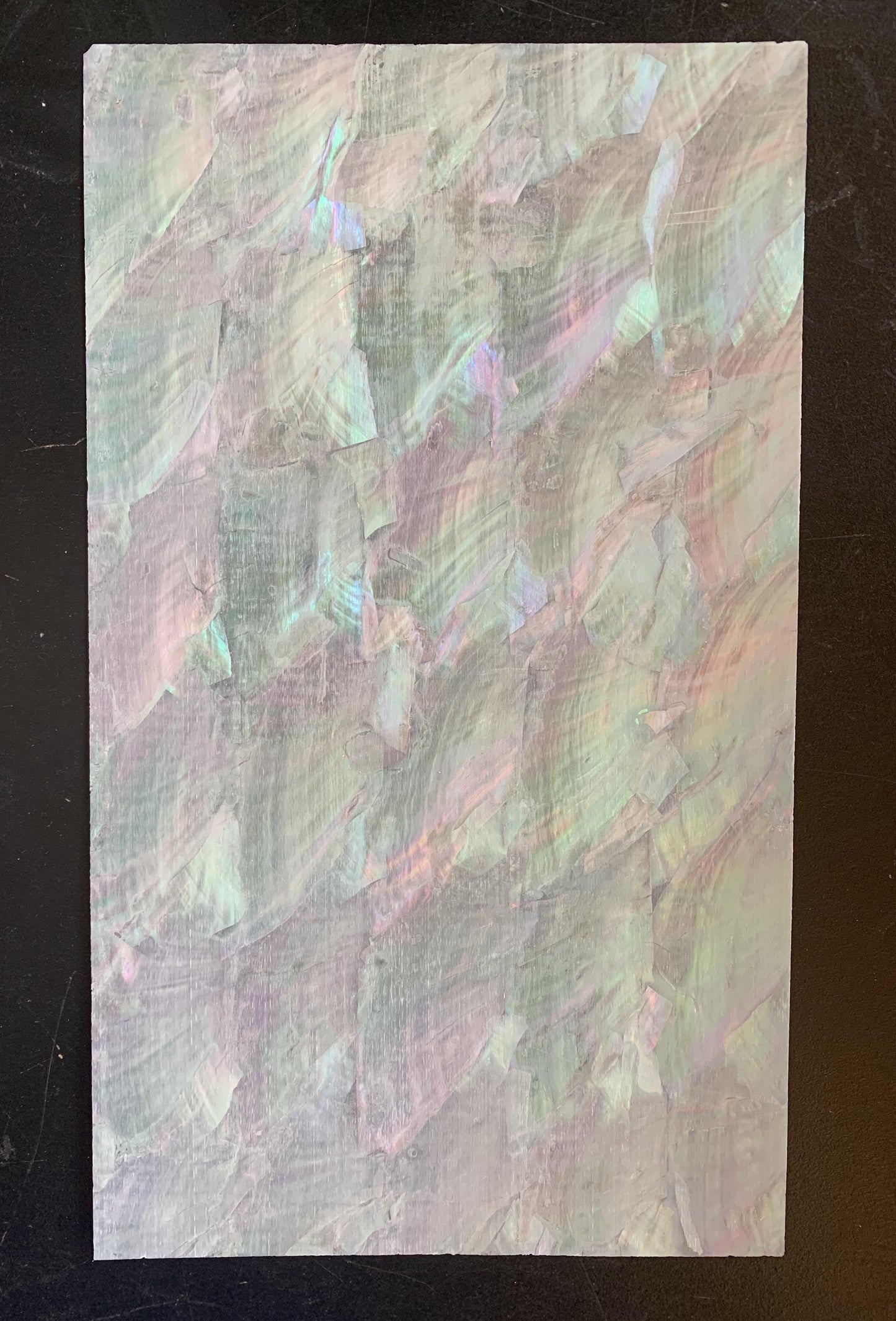 Donkey ear abalone laminated shell sheets are made from genuine shell. Each sheet has shell throughout consisting of layers of smaller shell pcs. Sheet size 235 x 135mm (9.25 x 5.3"). Thickness 1mm (0.04") Ideal for inlay work, marquetry, jewellery, knife handles. Economical and easy to cut. All layers are A grade same consistency throughout the sheet.