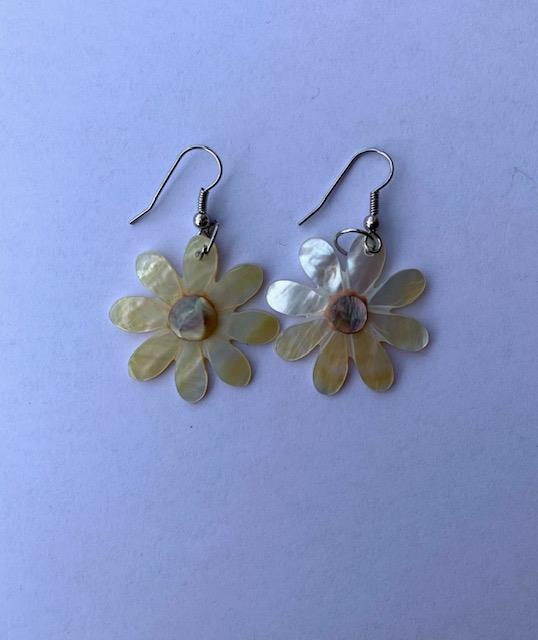 <p>Genuine shell earrings, made from real mother of pearl shells. Beautiful present for a special someone or to spoil yourself. Each set of earrings are handmade.</p>