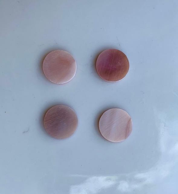 Awabi shell dots 9.5mm diameter 1.3mm thickness are round flat shell pcs cut to precise diameter and thickness. Ideal for use in inlay applications - for fretboard markers and general inlay or jewellery decorations. All dots are A grade.