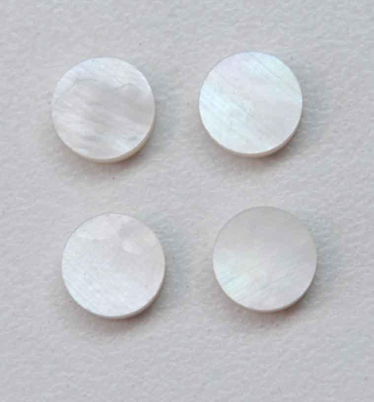 <p>White Mother of Pearl dots 9mm diameter x 3mm thickness - round flat shell pcs cut to precise diameter and thickness. Ideal for use in inlay applications - for fretboard markers, bow frog eyes and general inlay or jewellery decorations. All dots are A grade good on both sides.<br /></p>