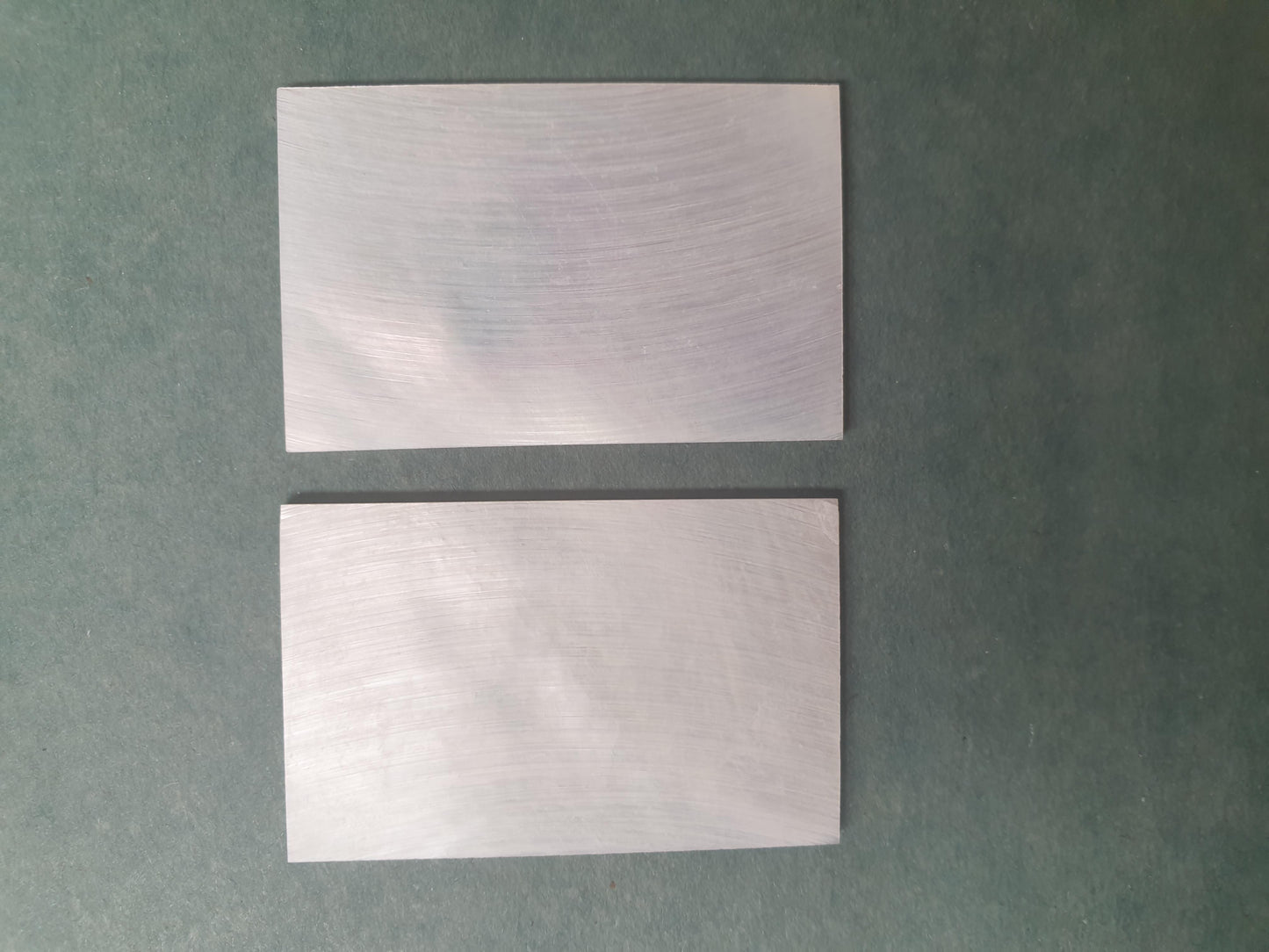 <p>White Mother of Pearl flat, no figure, clear face size 35mm (1.38") width x 55mm (2.16") length x 1.5mm (0.06") thickness A grade good on both sides.</p>