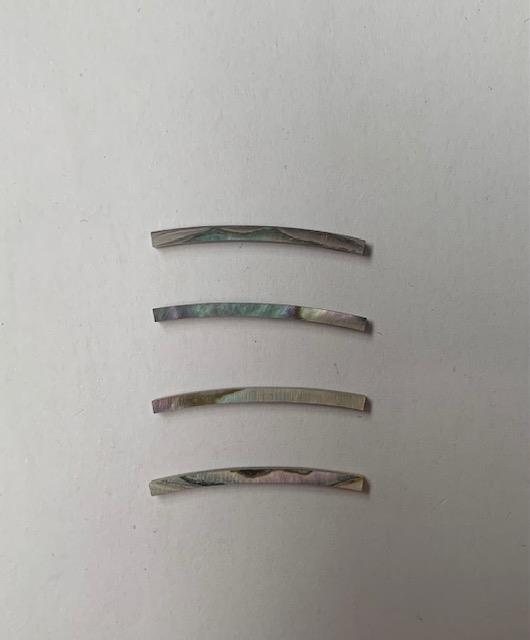 <p>Pink abalone solid shell curved strips 1.5mm (0.06") width x 24mm (0.94") length x 1.5mm (0.06") thickness x 120mm (4.72") inside diameter. A grade quality good on both sides, flat and uniform in thickness and width. Ideal for use in purfling and rosettes on musical instruments - Ukuleles, guitars, mandolins etc. as well as in furniture, jewellery and other decorative applications.</p>