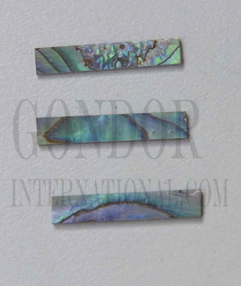 <p>Paua solid shell straight strips laminated 1mm (0.04") width x 20mm (0.8") length x 1.5mm (0.06") thickness. A grade quality good on both sides, flat and uniform in thickness and width. Ideal for use in purfling on musical instruments - Ukuleles, guitars, mandolins etc. as well as in furniture, jewellery ans other decorative applications.</p>