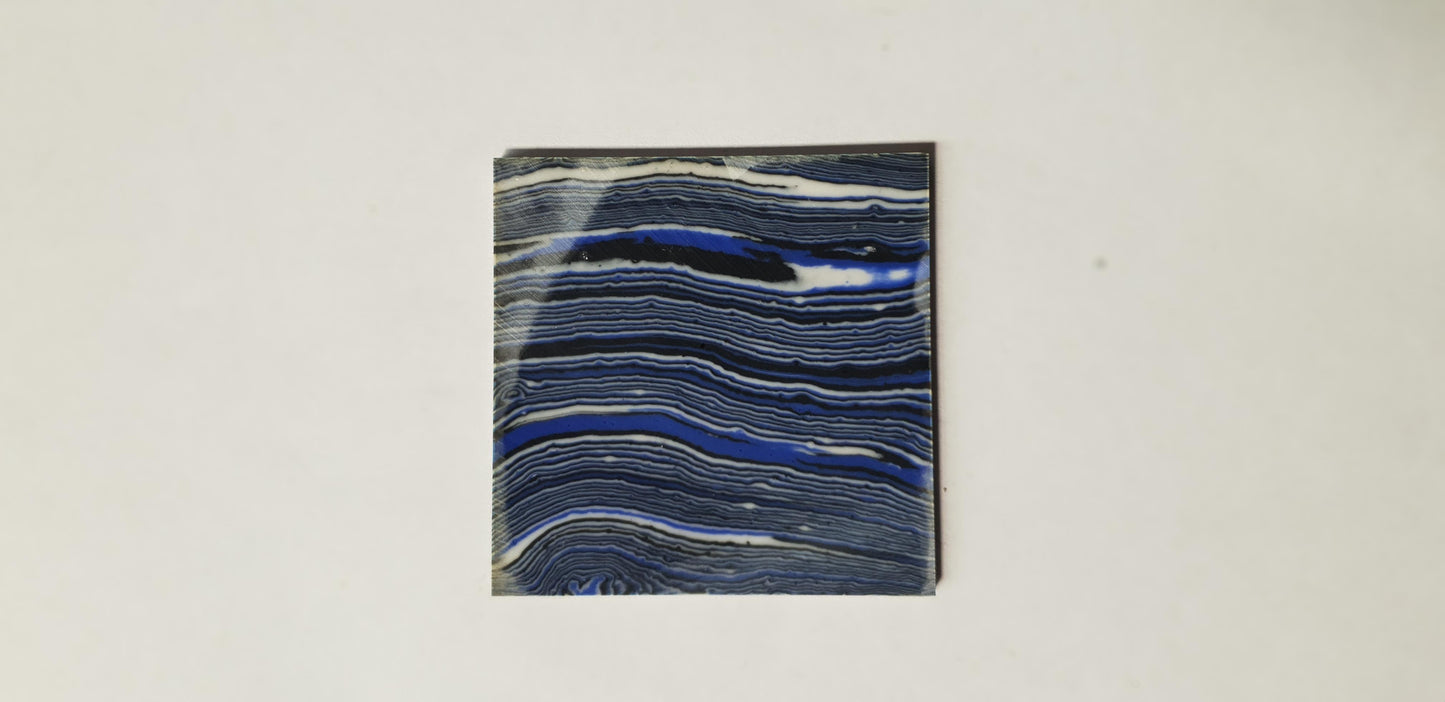 <p>Dark Blue Agate M110 reconstituted stone blanks 50 x 50 x 2mm suitable for inlay. Can be cut with standard cutting tools - jewellery saw similar in characteristics to mother of pearl (hardness approx. 3. Can be sanded and polished same way as shell material. All pcs are A grade good on both sides.</p>