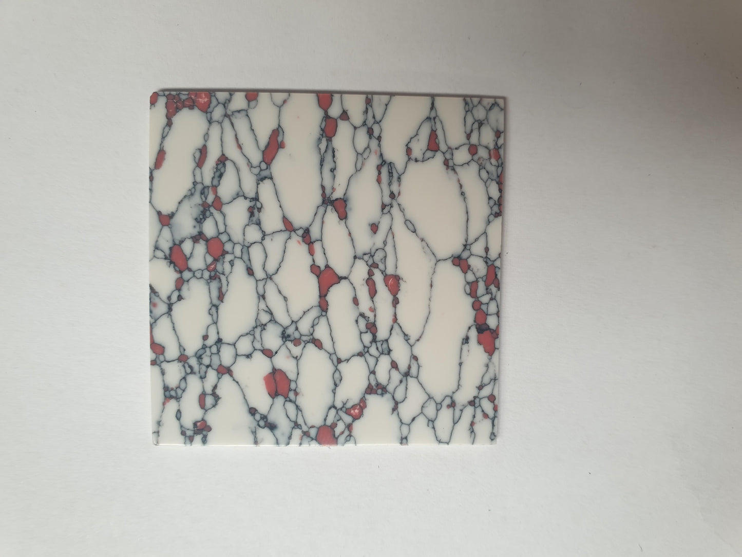 <p>Marble Bohemian CH2E6 reconstituted stone blanks 50 x 50 x 1.5mm polished 1 side suitable for inlay and other decorations. Can be cut with standard cutting tools - jewellery saw similar in characteristics to mother of pearl (hardness approx. 3.) Can be sanded and polished same way as shell material. All pcs are A grade good on both sides.</p>