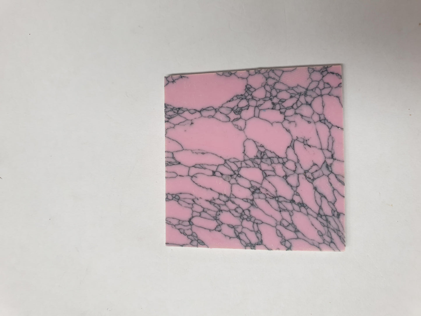<p> Pink stone B4CH2 reconstituted stone blanks polished 1 side 50 x 50 x 1.5mm suitable for inlay. Can be cut with standard cutting tools - jewellery saw similar in characteristics to mother of pearl (hardness approx. 3. Can be sanded and polished same way as shell material. All pcs are A grade good on both sides.</p>