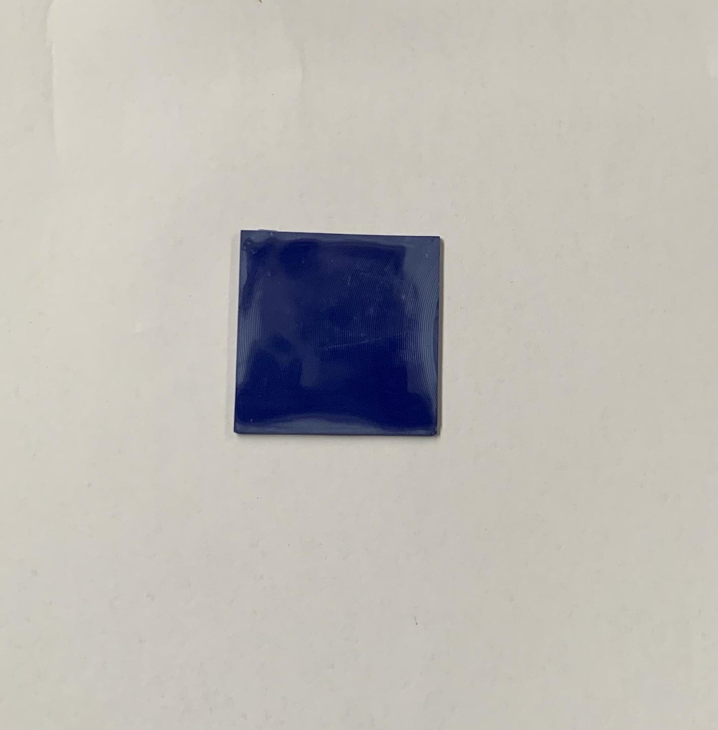 <p>Navy stone artificial stone blanks 50 x 50 x 2mm suitable for inlay. Can be cut with standard cutting tools - jewellery saw similar in characteristics to mother of pearl (hardness approx. 3. Can be sanded and polished same way as shell material. All pcs are A grade good on both sides.</p>