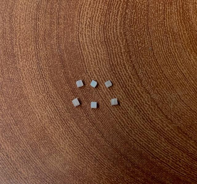 <p>White Mother of Pearl inlay squares 2mm x 1.3mm thickness - flat shell pcs cut to precise diameter and thickness. Ideal for use in inlay applications - for fretboard markers, and general inlay or jewellery decorations. All pieces are A grade good on both sides. </p>